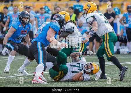 Poland. 26th June, 2021. European League of Football: Panthers Wroclaw (blue shirts) vs Leipzig Kings (white shirts) at the Olympic Stadium in Wroclaw, Poland on June 26th 2021 Pictured: Robert Kahlke (77) Credit: Piotr Zajac/Alamy Live News Stock Photo