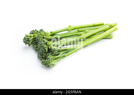 Raw broccolini heap isolated on white background Stock Photo