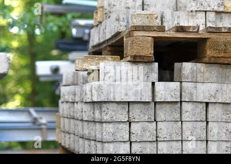 Cobble stones on palette at construction site Stock Photo