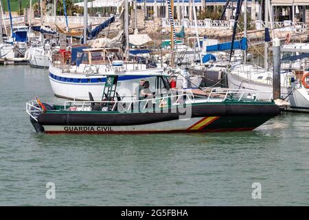 El Puerto de Santa María, Cádiz, Spain - June 16, 2021: High speed boat of the Civil Guard leaving the port. State security forces and bodies, Andalus Stock Photo