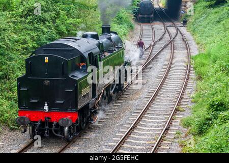 Duffield, Derbyshire, UK, June 22, 2021:Ecclesbourne Valley Railway with Preserved Steam Locomotive 80080 at Duffield Station Shunting in between Rail Stock Photo