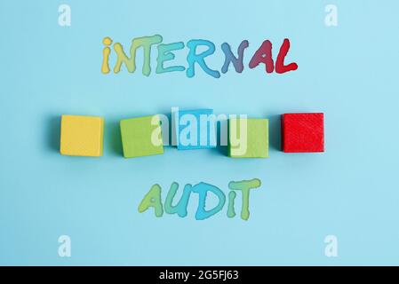 Conceptual display Internal Audit. Business approach evaluates the objective assurance to improve a firm s is operation Stack of Sample Cube Stock Photo
