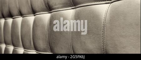 Tufted grey leather headboard texture, used for background Stock Photo