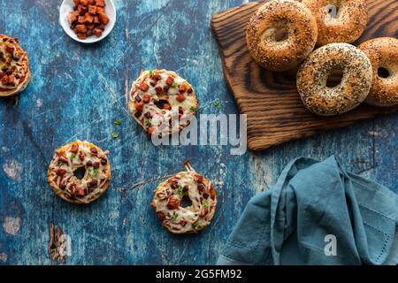 Top down view of homemade everything pizza bagels ready for eating. Stock Photo