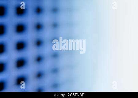 Abstract macro photography. Close up blue fence with square grid pattern Stock Photo