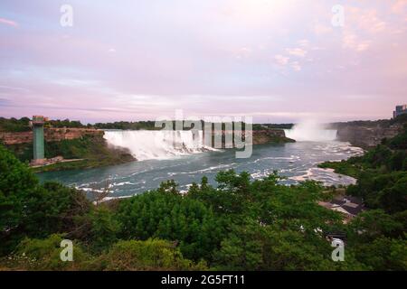 Close up of the American Falls, Niagara Falls at Dusk. Beautiful shot of the flow of water at the Niagara Falls, USA. Stock Photo