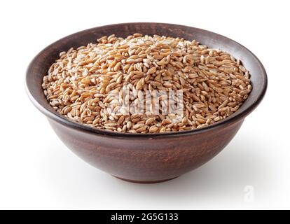 Grains of spelt in ceramic bowl isolated on white background wiht clipping path Stock Photo