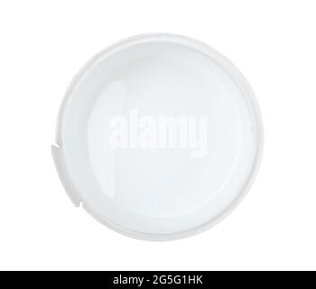 Opened plastic bucket with white paint isolated on white. Top view. Stock Photo