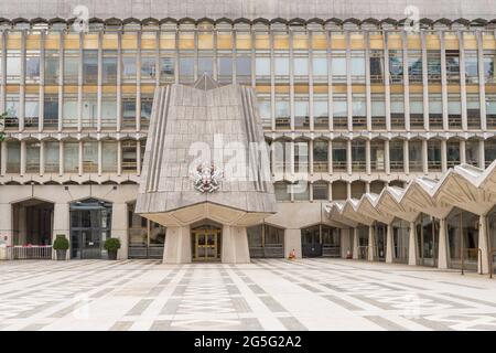 The outside stone entrance of the Guildhall Library with no people. London - 27th June 2021 Stock Photo