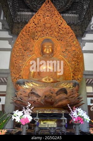 Buddha statue in the Byodo'In Temple, Oahu, Hawaii Stock Photo