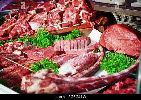 Different cuts of beef exposed in the butcher's counter Stock Photo