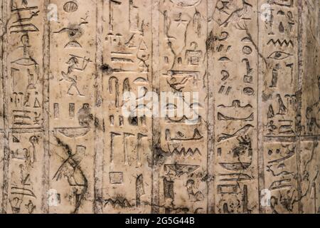 Ancient Egyptian hieroglyphs in column carved in marble - close-up with much detail and chisel marks clear Stock Photo