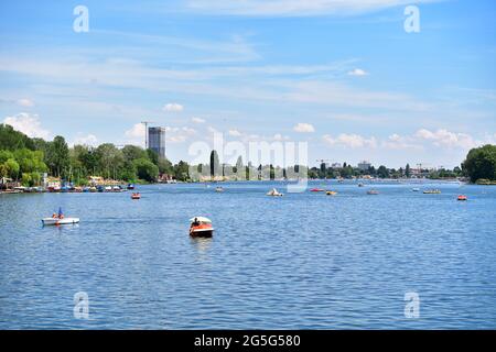 Vienna, Austria. 27th June, 2021. A hot summer day on the Old Danube. Many Viennese seek cooling in the river. Stock Photo