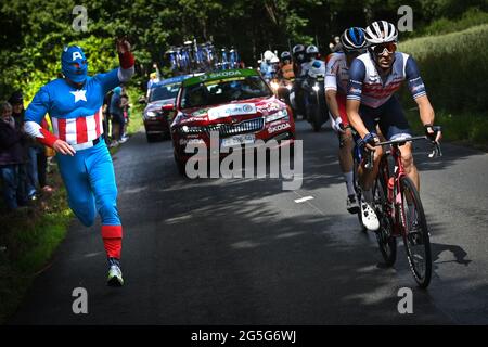 Illustration picture shows a fan running on the side of Belgian Edward Theuns of Trek-Segafredo during the second stage of the 108th edition of the To Stock Photo