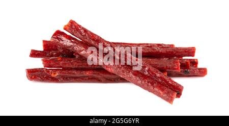Dry salmon sticks isolated on white background. Dried fish snacks for beer. Stock Photo