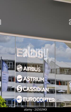 EADS exhibition chalet at Farnborough International Airshow trade fair 2012, UK. Group including Airbus, Astrium, Cassidian and Eurocopter. Promotion Stock Photo