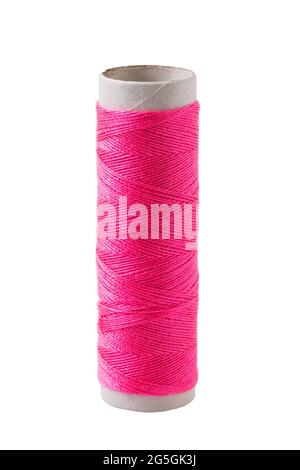 One reel of pink threads, isolated on a white background Stock Photo