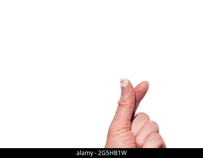 A hand making a heart shape with two fingers on a white isolated background. Korean symbol of love with fingers. Finger heart. Stock Photo