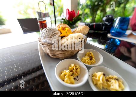 Various breads in the basket at Restaurant Stock Photo