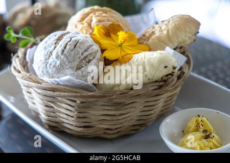 Various breads in the basket at Restaurant Stock Photo