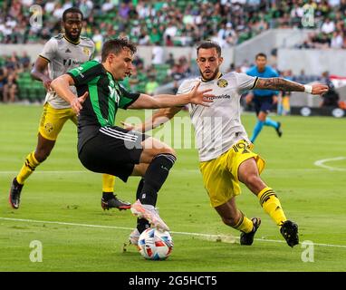 Austin, Texas, USA. 27th June, 2021. Austin FC midfielder Jared Stroud (20) works against Columbus Crew defender Milton Valenzuela (19) during the first half of a Major League Soccer match between Austin FC and the Columbus Crew on June 27, 2021 in Austin, Texas. Credit: Scott Coleman/ZUMA Wire/Alamy Live News Stock Photo