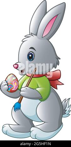 Cartoon rabbit painting easter egg with a brush Stock Vector