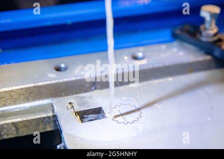 Electrolysis CNC milling machine for precise cutting of metal parts on factory. Stock Photo