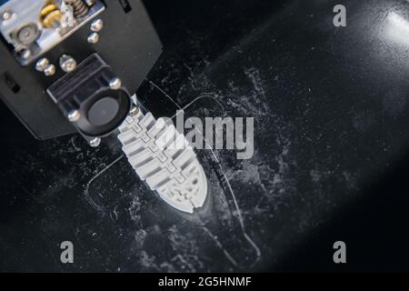 Closeup 3D Printer mechanism working element design of device during processes. Stock Photo