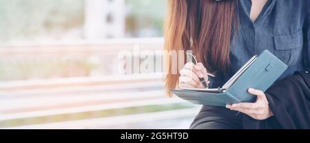 Agenda of planner woman schedule and organize appointment 2019 Calendar Event. Smart Business woman note and schedule to set timetable organize schedu Stock Photo