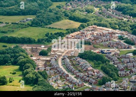An aerial view of new housing under construction, Bolton, Lancashire, northern England, UK Stock Photo