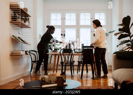 Businessman and businesswoman working together in home office Stock Photo