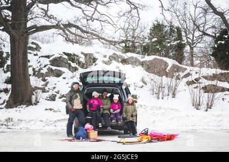 Full length of happy family on winter vacation Stock Photo