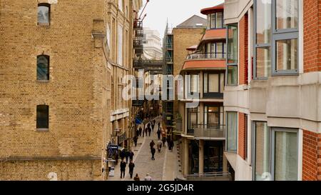LONDON, UNITED KINGDOM - Feb 08, 2018: Shad Thames is a historic street near of Tower Bridge. Its lined warehouses converted into flats. A feature is Stock Photo
