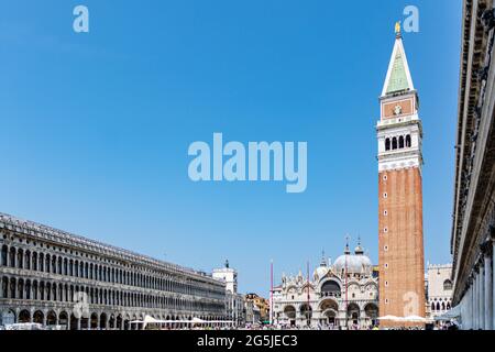 Low angle view of the famous Bell Tower Campanile at the St Marc's Square in Venice, Italy Stock Photo