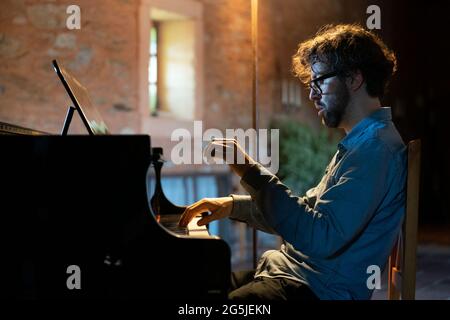 Portuguese pianist Filipe melo playing piano Stock Photo