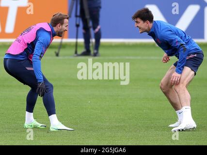 England's Harry Kane and Harry Maguire during a training session at St ...