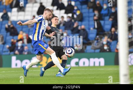 Phil Foden of Manchester City scores their second goal during the Premier League match between Brighton and Hove Albion and Manchester City at the American Express Stadium  , Brighton , UK - 18th May 2021 - Editorial use only. No merchandising. For Football images FA and Premier League restrictions apply inc. no internet/mobile usage without FAPL license - for details contact Football Dataco