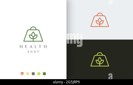 shopping bag logo for natural or organic shop in simple and modern style Stock Vector