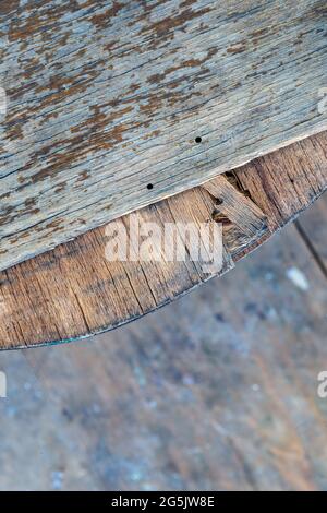 close-up colorful old rusty plywood with peeling paint on it. Old wooden material Stock Photo