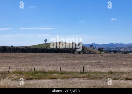 Electricity generating windmill Farms Hume Highway NSW Australia taken from moving car blurred foreground Stock Photo