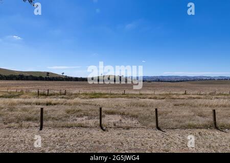 Electricity generating windmill Farms Hume Highway NSW Australia taken from moving car blurred foreground Stock Photo