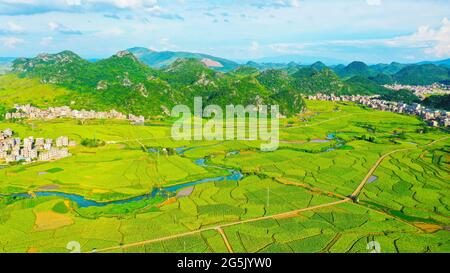 Xintian, China. 27th June, 2021. The beauty of green field in summer in Xintian, Hunan, China on 27th June, 2021.(Photo by TPG/cnsphotos) Credit: TopPhoto/Alamy Live News Stock Photo