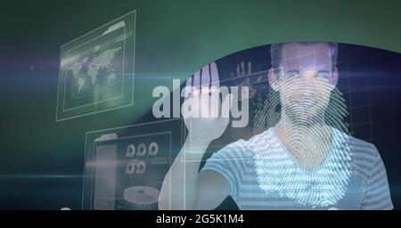 Composition of fingerprint and businessman touching interactive screen with data processing Stock Photo