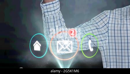 Composition of digital icons over midsection of businessman Stock Photo