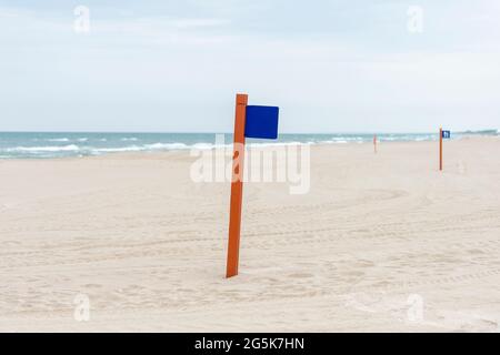 A sign on the beach. Copy space and free space for text on wooden table Stock Photo