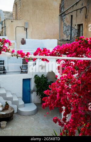 Lines of a stairway and blue door on Santorini Island in Greece. Stock Photo