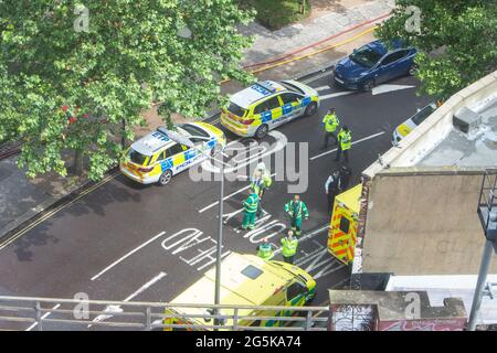 Police and emergency services viewed from above in action at a fire in Elephant and Castle Stock Photo