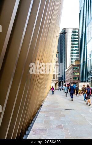 Curved facade of 70 St Mary Axe (Can of Ham) along Bevis Marks Street in the City of London, UK Stock Photo