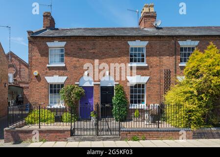 Pair of smart red brick terraced houses on Windsor Street in Stratford-upon-Avon, Warwickshire Stock Photo