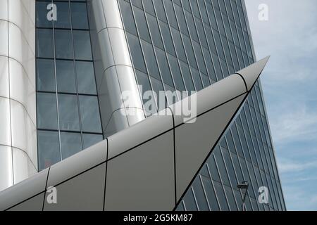 abstract modern architectures balcony detail fence whit blue sky in city life - Milan Italy Stock Photo